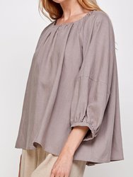 Round neck shirred balloon-sleeve cuffs top