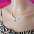 Silver Sculpted Angel Wings Crystal Drop Necklace