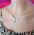 Silver Sculpted Angel Wings Crystal Drop Necklace