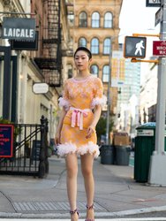 Mini Yellow Knit Skirt with feather details