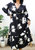 Plus Size White Tulip Print Flowy Black Midi Dress