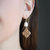 Andee Pearl & Quilted Metal Clover Drop Earrings In Worn Gold