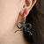 Veronica Game Day Bow Enamel Earrings In Black