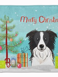 19 in x 27 in Christmas Tree and Border Collie Machine Washable Memory Foam Mat