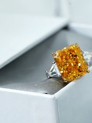 Yellow Emerald And Trapeze Cut Engagement Ring