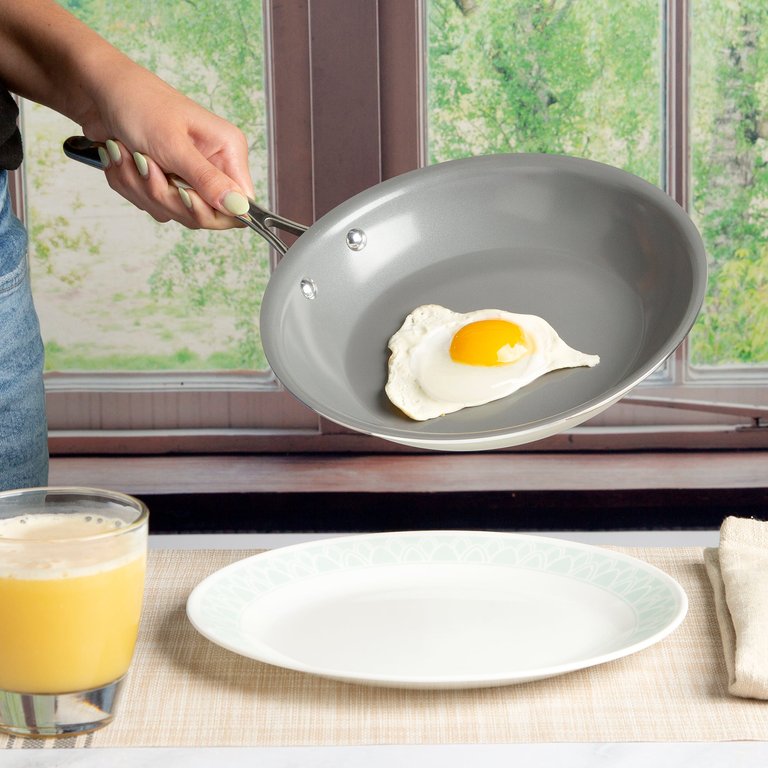 https://images.verishop.com/goodful-kitchen-goodful-11-inch-ceramic-nonstick-frying-pan-dishwasher-safe-skillet-with-comfort-grip-stainless-steel-handle-pfoa-free-cream/M00741393480047-3071561171?auto=format&cs=strip&fit=max&w=768