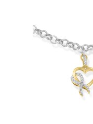 10K Yellow Gold 1/10 Cttw Diamond Awareness Ribbon & Heart Charm on 7" .925 Sterling Silver Rolo Bracelet