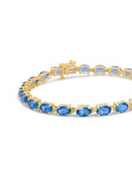 10K Yellow Gold and 4 Prong Set 6X4 MM Blue Topaz Link Tennis Bracelet - Size 7" - Gold