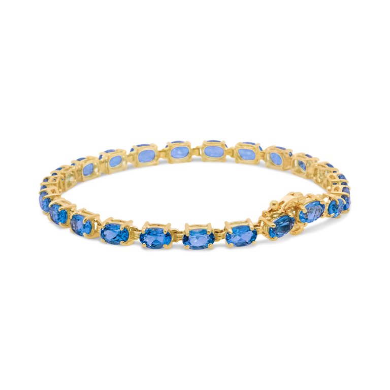 10K Yellow Gold and 4 Prong Set 6X4 MM Blue Topaz Link Tennis Bracelet - Size 7"