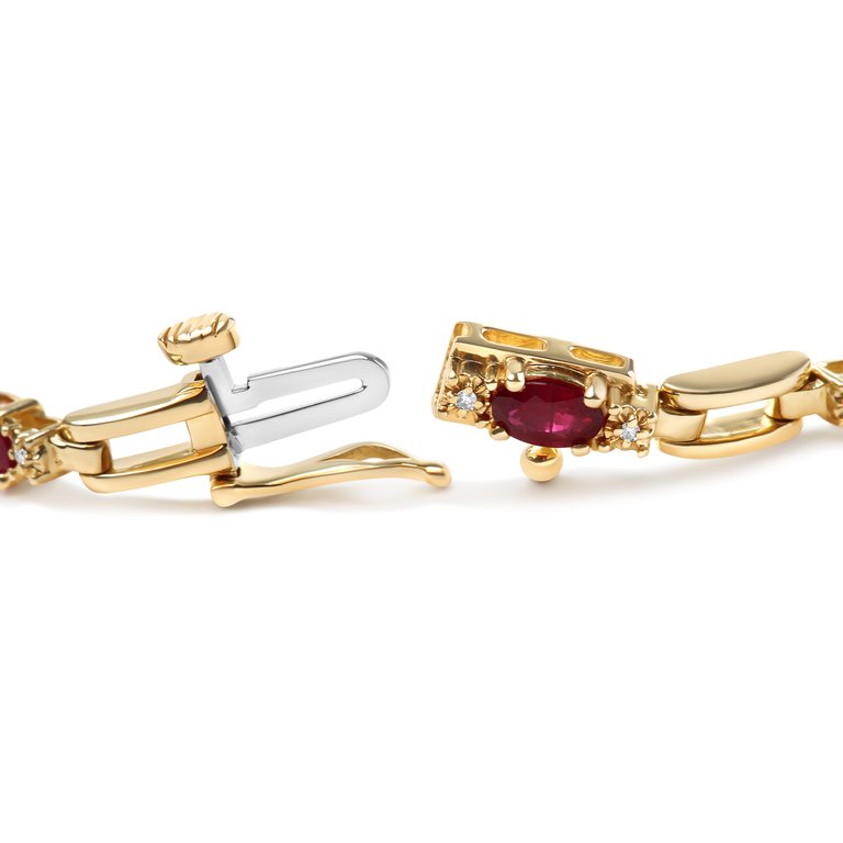 10K Yellow Gold Oval Ruby and 1/10 Cttw Diamond Bar Prong Set Bracelet (H-I Color, SI1-SI2 Clarity) - Size 7"