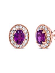 14K Rose Gold 7x5mm Oval Cut Garnet And 3/8 Cttw Round Diamond Halo Stud Earrings - G-H Color, SI1-SI2 Clarity