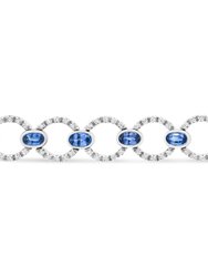 18K White Gold 6 Cttw Diamond and 5x3mm Oval Blue Sapphire Openwork Circle Link Bracelet (F-G Color, SI1-SI2 Clarity) - Size 7"