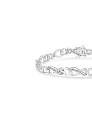 .925 Sterling Silver 1/5 Cttw Diamond 7” Infinity Heart Tennis Bracelet - White