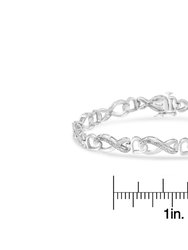 .925 Sterling Silver 1/5 Cttw Diamond 7” Infinity Heart Tennis Bracelet