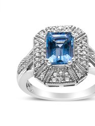 .925 Sterling Silver Diamond Accent And 8 x 6 mm Emerald-Shape Blue Topaz Ring (I-J Color, I2-I3 Clarity) - Ring Size 7