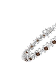 .925 Sterling Silver, Lab-Grown Gemstone and 1/6 Cttw Round Diamond Tennis Bracelet