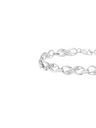 .925 Sterling Silver Prong Set Diamond Accent Ribbon and Infinity Link Bracelet - White