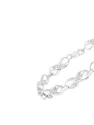 .925 Sterling Silver Prong Set Diamond Accent Ribbon and Infinity Link Bracelet