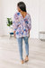 Fabled In Floral Draped Peplum Top In Blue