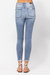 Distressed Denim Skinny Jeans In Washed Blue