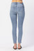 Distressed Skinny Jeans In Light Wash