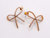 Golden Bow Tie Sparkle Earrings