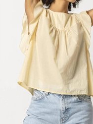 Sleeveless Ruffle Top In Shell