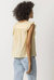 Sleeveless Ruffle Top In Shell