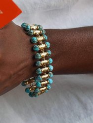 Twisted Rays Turquoise Bracelet In 14K Yellow Gold Plated Sterling Silver