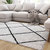 5' x 7' Ivory and Black Shag Style Diamond Trellis Area Rug