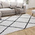 5' x 7' Ivory and Black Shag Style Diamond Trellis Area Rug