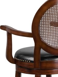 Mathieu 30" Swivel Bar Stool With Oval Rattan Back, Arms And Black Faux Leather Upholstered Swivel Seat In Espresso