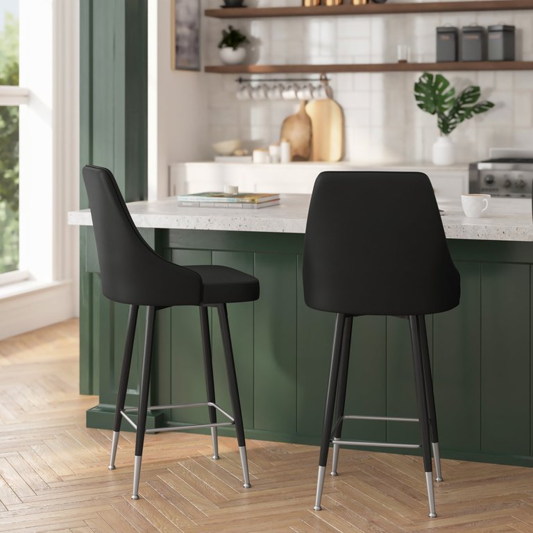 Petra Set Of Two Modern Bar Height Faux Leather Upholstered Dining Stools With Chrome Accented Metal Frames And Footrests - Black