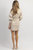 Bowery Faux Leather Mini Dress In Cream