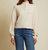 Evan Cropped Turtleneck Top In White Chocolate - White Chocolate