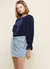 Stitch Accent Puff Shoulder Bell Cuff Top in Navy