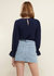 Stitch Accent Puff Shoulder Bell Cuff Top in Navy