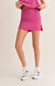 Elite Mini Skort In Berry - Berry