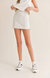 Elite Mini Skort In White - White