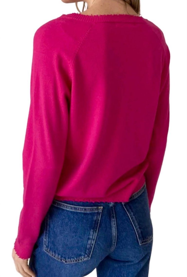 Distressed Hem Vneck Sweater In Hot Pink