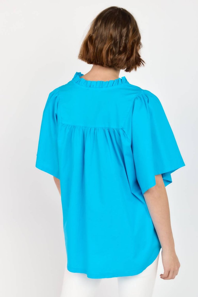 Noelia Flutter Sleeve Blouse In Turquoise