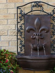 French Lily Solar with Battery Outdoor Wall Fountain 33" - Bronze