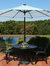 Sunnydaze 9' Aluminum Outdoor Solar LED Lighted Umbrella with Tilt - Teal Stripe