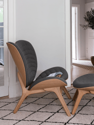 A Conversation Piece Tall Lounge Chair